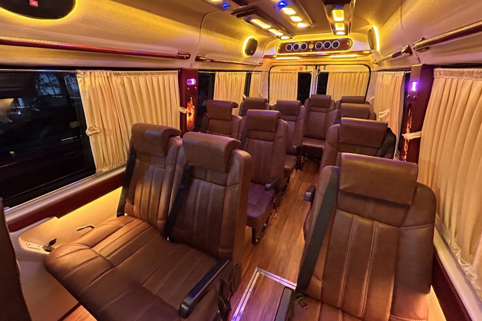 premium 10 seater tempo traveller in Kerala